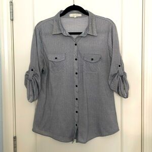 Pinstriped, button down blouse.